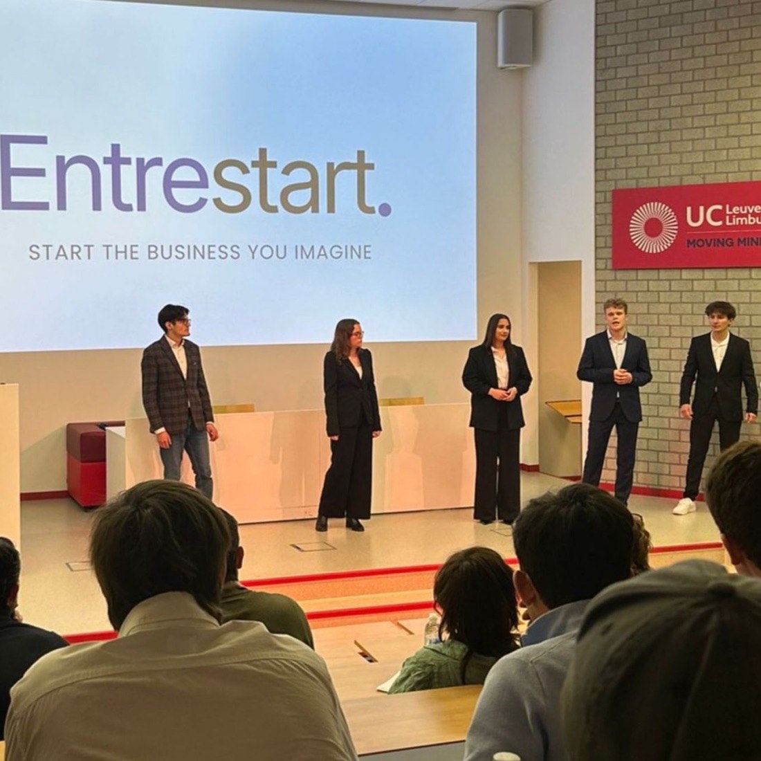 Entrestart pitching on stage